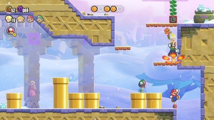 Toad hits a hidden block to release a vertical vine in Super Mario Bros Wonder