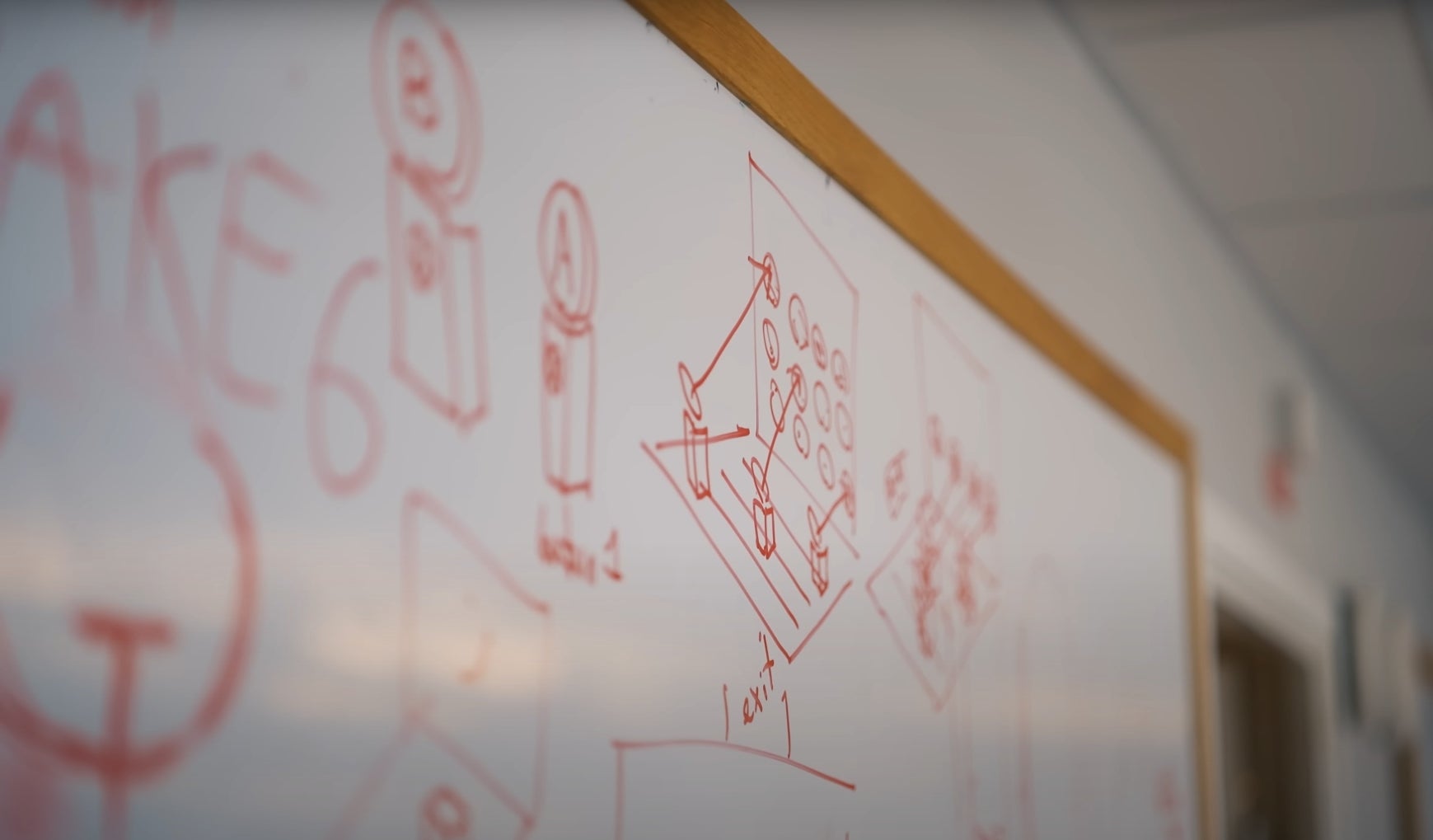 A whiteboard that seems to hint at Quake 6. Because it says &ldquo;AKE 6&rdquo; on it next to a Quake logo.