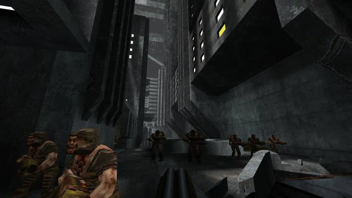 Exploring concrete hell in a screenshot from Quake’s Brutalist Jam 2 map pack.