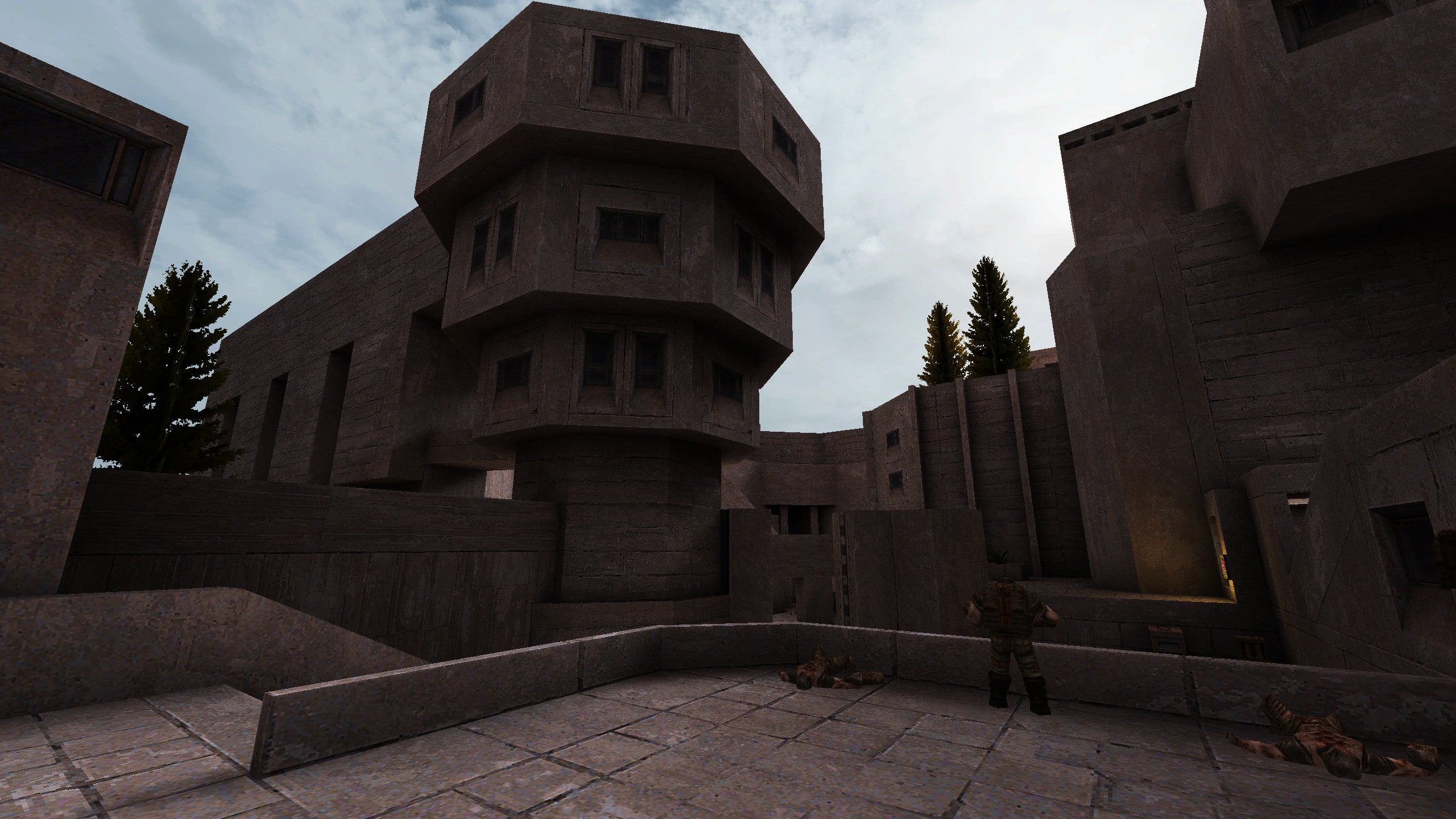 An otherworldly concrete space in the Quake Brutalist Jam map pack.
