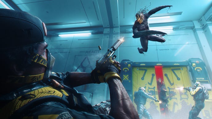 An Operator lies on the floor and aims a pistol at a leaping alien in Rainbow Six Extraction’s limited-time mode Spillover.