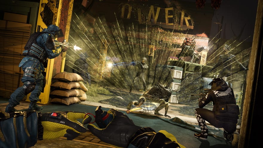 Two operators fire on a group of Archaens as another pulls the pin on a grenade in Rainbow Six: Extraction.