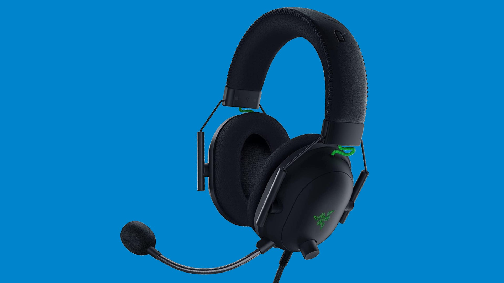 Razer&rsquo;s Blackshark V2 gaming headset on a blue background.