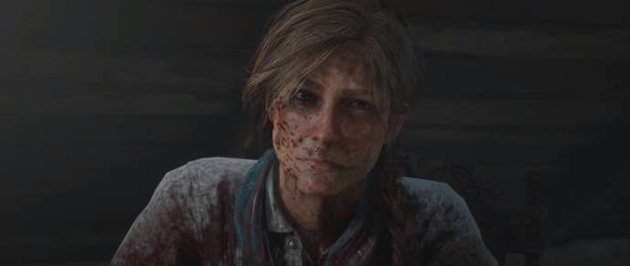 Sadie Adler with blood on her face in Red Dead Redemption 2.