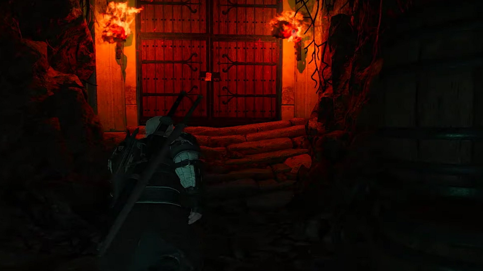 Witcher 3 Netflix quest: A man in striped armor approaches two large wooden doors illuminated by red firelight - 5