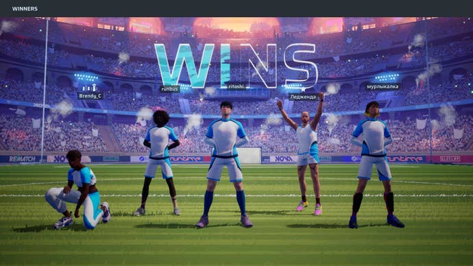 The winning squad makes a triumph pose.