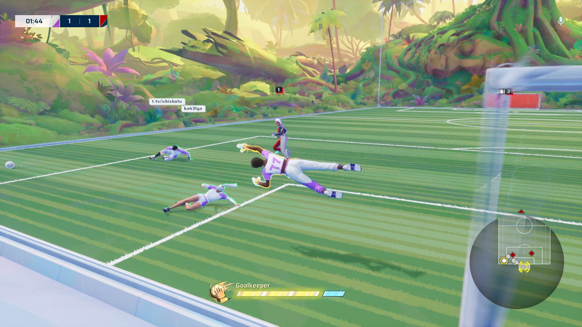 The player dives as a goalkeeper to save a shot. - 11