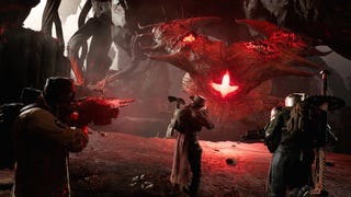 Three characters dressed like cowboys aim their guns at a giant alien creature with a horn-like carapace and a red, cross-shaped orifice glowing from within.
