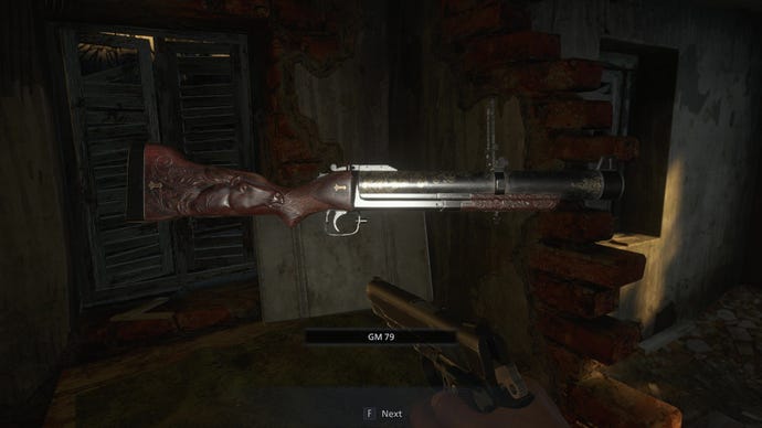 An image of the grenade launcher in Resident Evil Village.