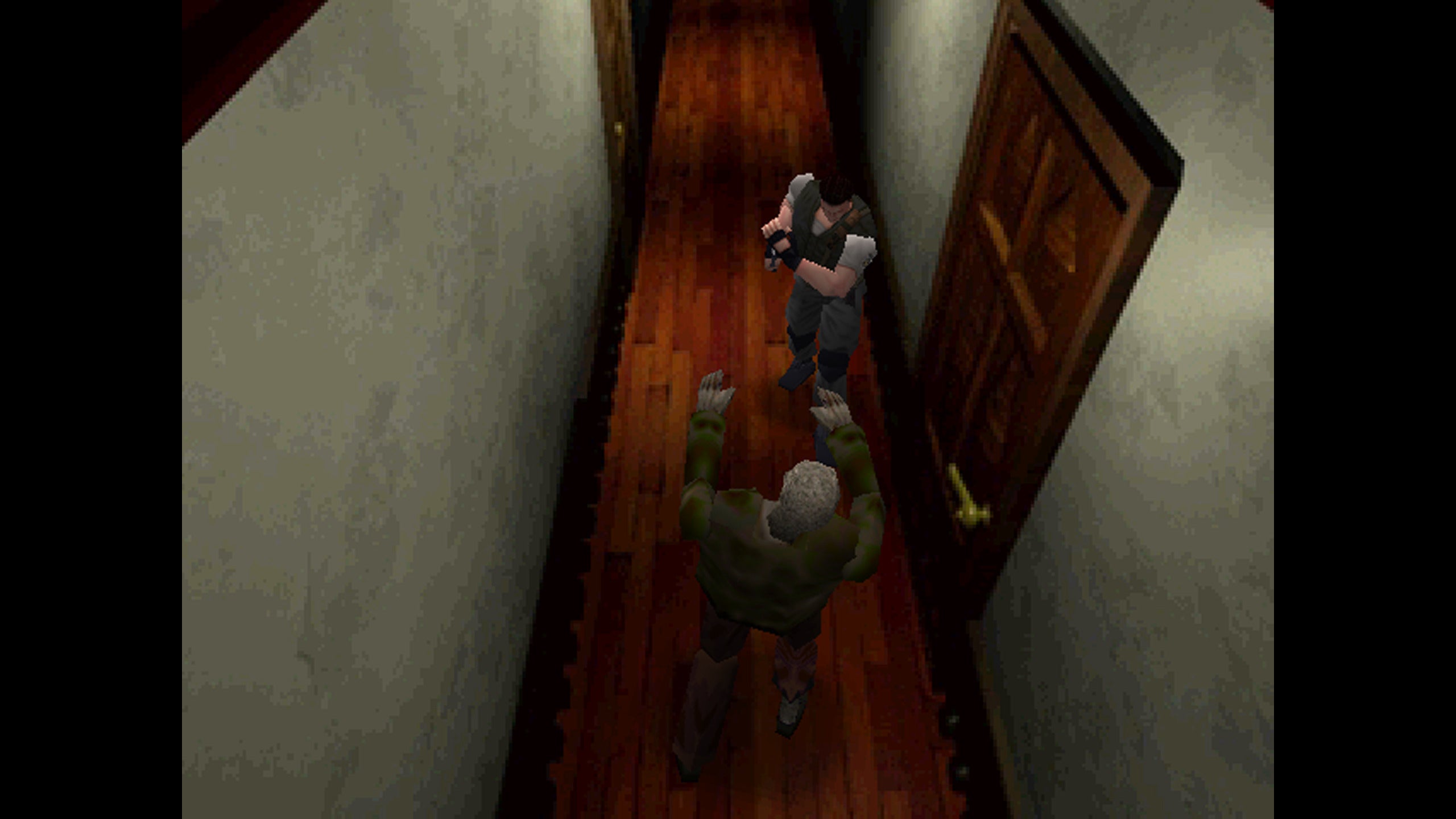 Chris Redfield about to shoot a zombie in the original Resident Evil game from 1996.