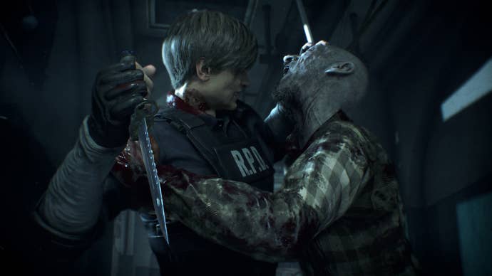 Leon Kennedy holding a knife as he is attacked by a zombie in the Resident Evil 2 remake.
