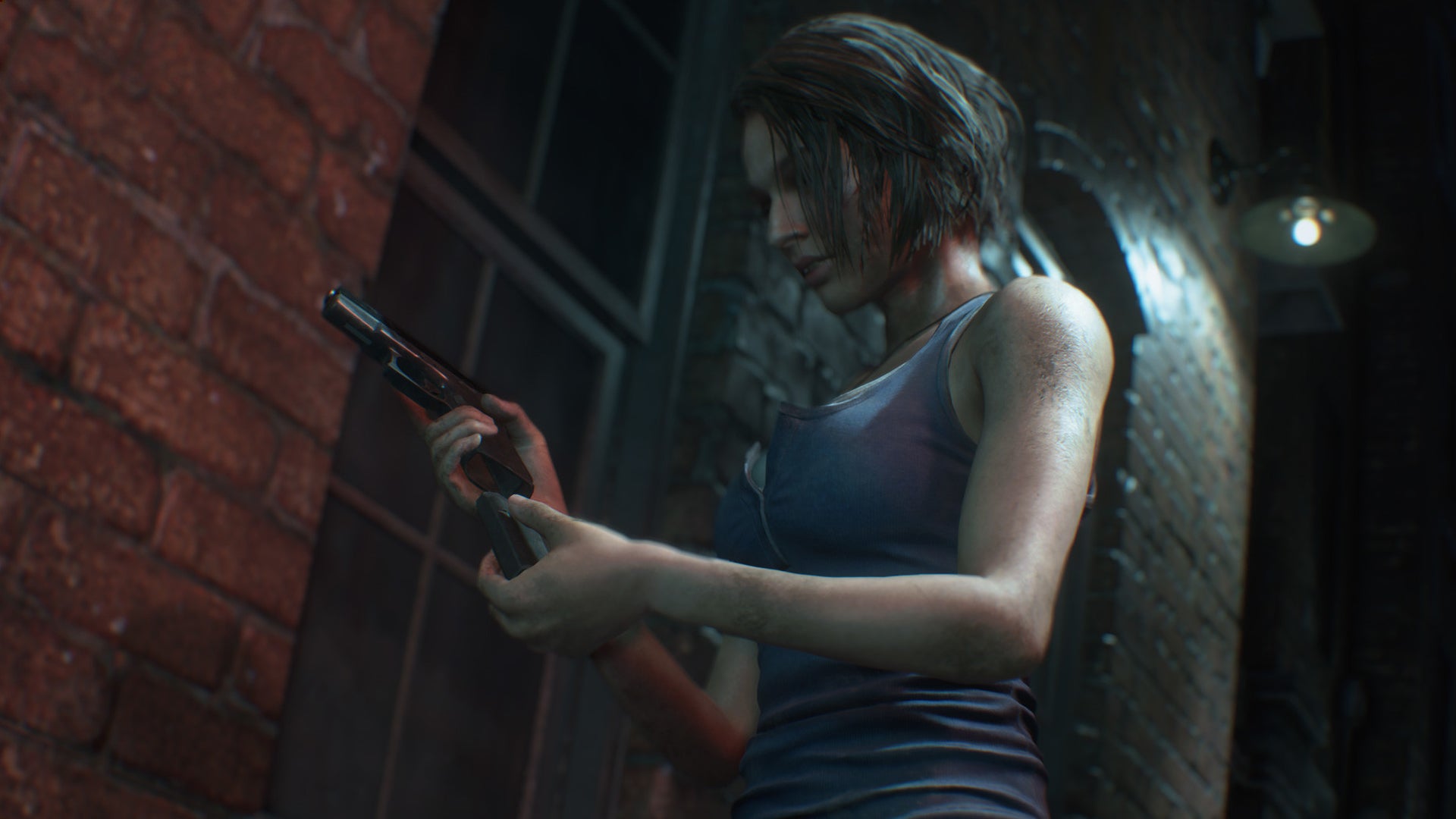 Jill Valentine holding a gun and loading it in the Resident Evil 3 remake.