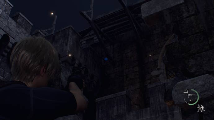 A blue medallion hung high above Leon's head on some scaffolding in the Castle Gate area of Resident Evil 4