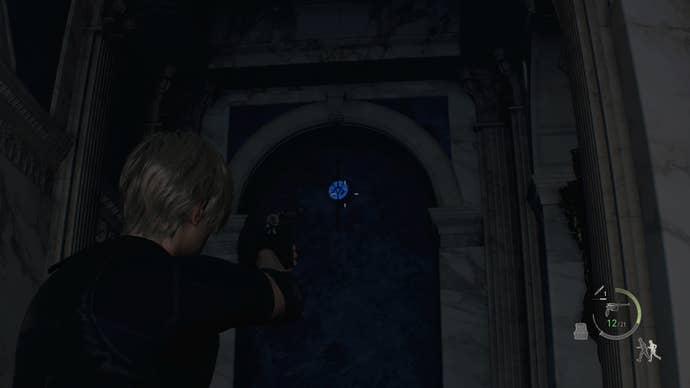 A blue medallion hanging in the entrance of the Great Hall in Resident Evil 4