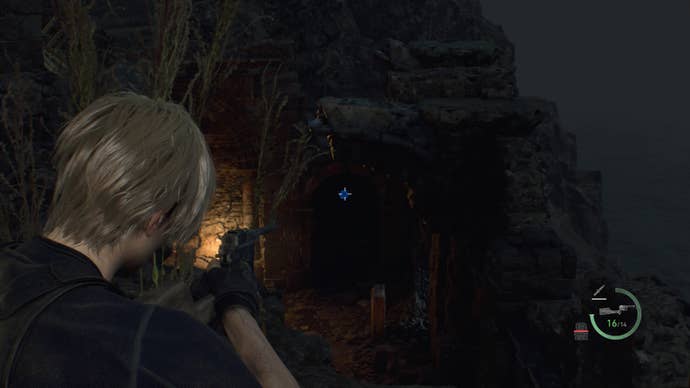 Leon Kennedy aiming his pistol at a blue medallion in the Cliffside Ruins in Resident Evil 4