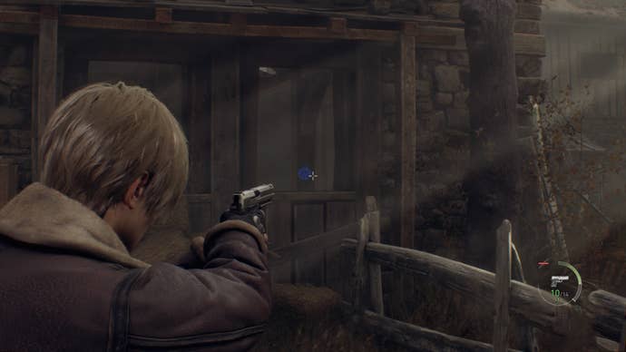 A blue medallion inside a horse barn in Resident Evil 4.