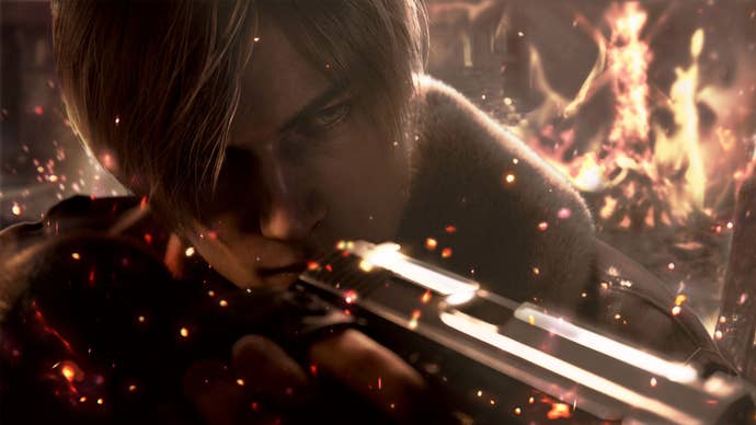 A close-up of Resident Evil 4’s Leon Kennedy, there is fire around him, and he’s holding a pistol close to his face, pointing it at something offscreen.