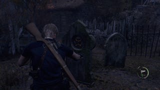 Leon Kennedy destroying an emblem carved into the top of a tombstone in Resident Evil 4