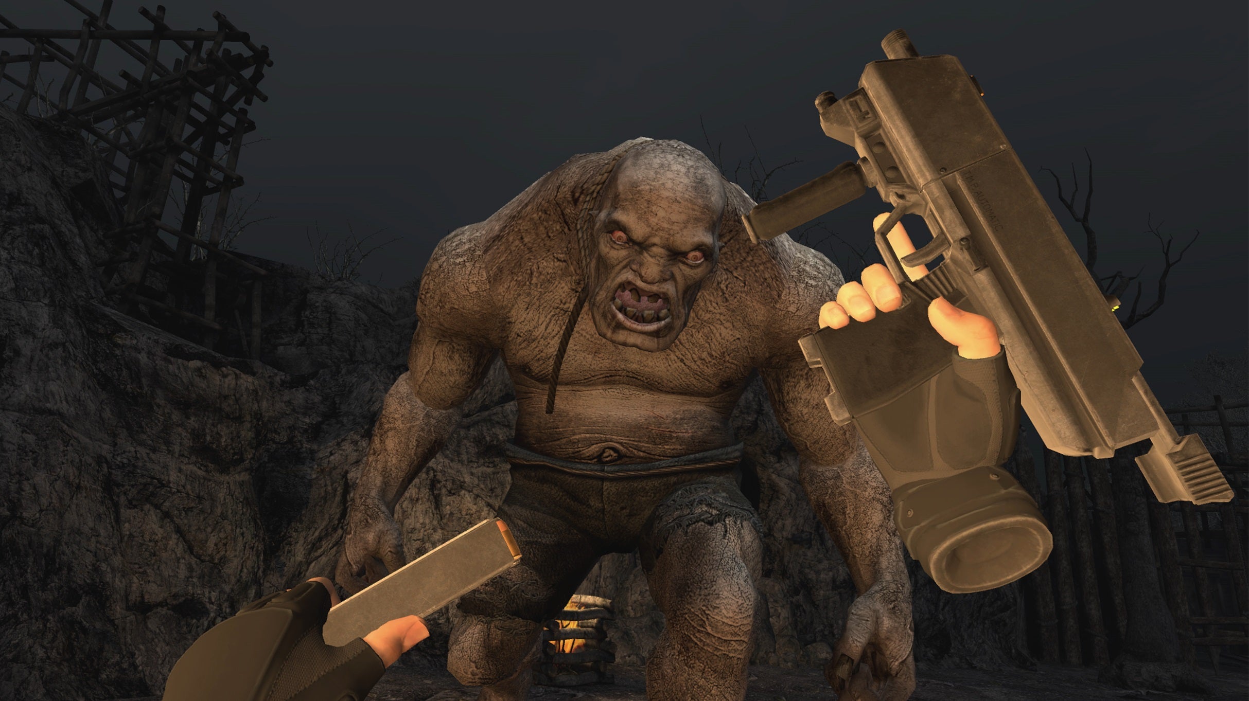 Resident Evil 4 VR - The player&rsquo;s disembodied VR hands are in the middle of reloading a gun as the El Gigante  boss approaches.