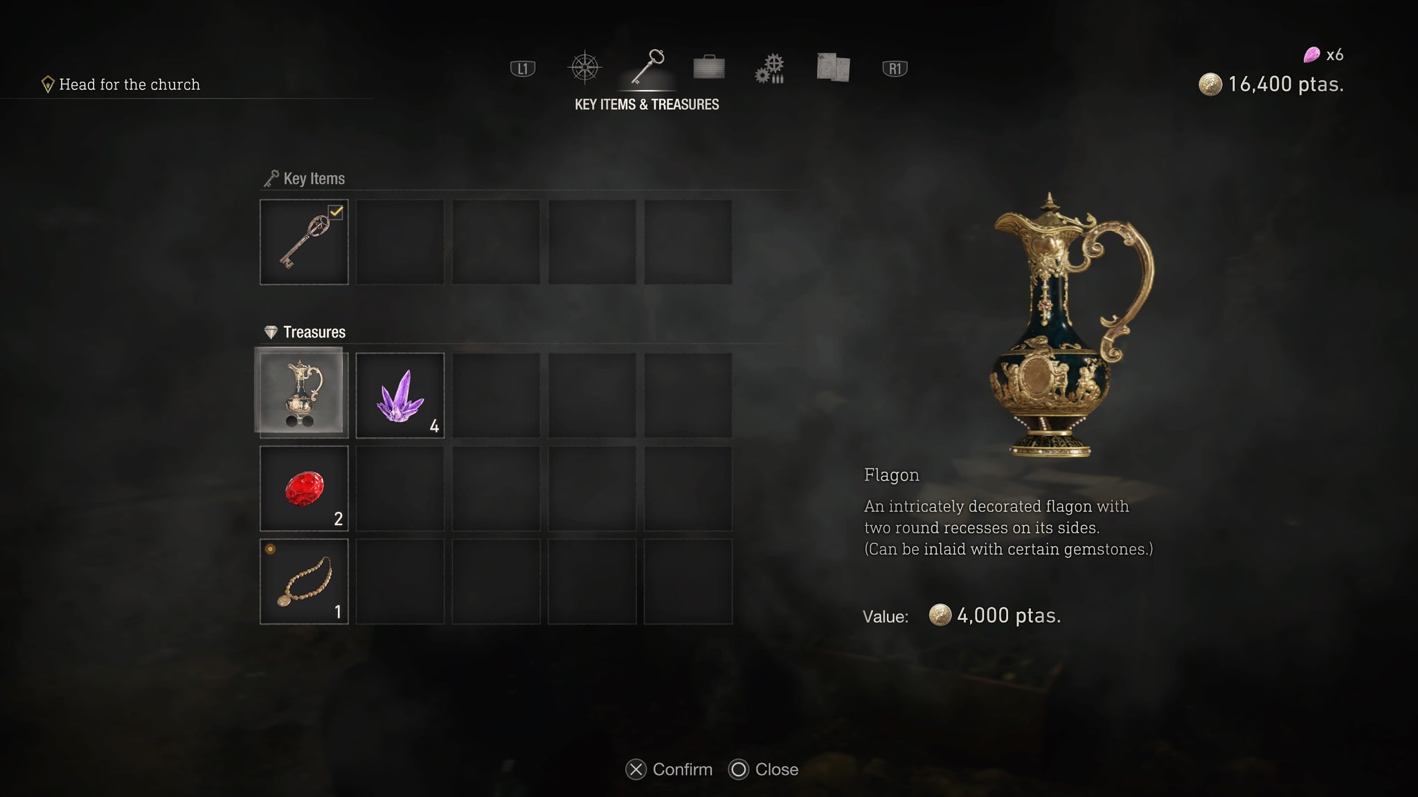 A golden flagon with slots for inlaying gems in Resident Evil 4. - 5