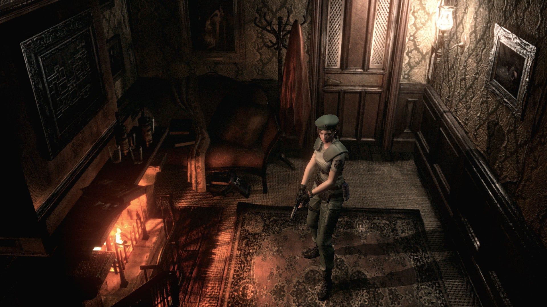 Jill Valentine holding a gun by a fireplace in the survival horror game Resident Evil Zero.