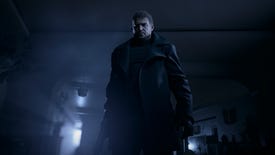 Resident Evil Village - Chris Redfield wears a trenchcoat and looks down at the player.