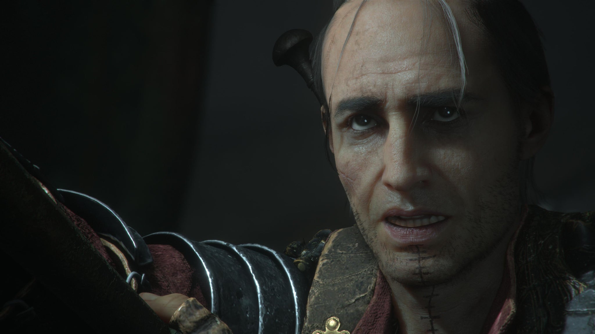 Resonance: A Plague Tale Legacy screenshot showing a close-up of Benjamin Homewood's Faro, a veteran thief with thin wisps of grey hair framing his forehead