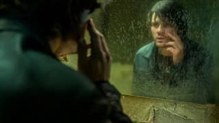 Image of Return to Silent Hill film showing Jeremy Irvine as James looking into grimy mirror