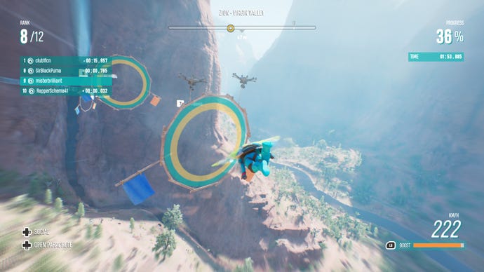 A man in a wingsuit flies through rings in Riders Republic