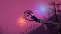 A bike held aloft above a rider's head, with burnt, bare trees providing the horizon for an otherworldly purple sky.
