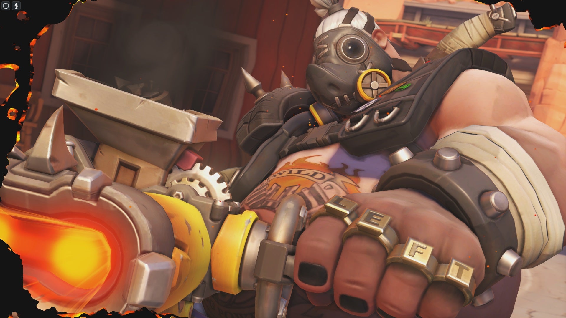 Overwatch&rsquo;s Roadhog shooting his chain gun at the camera.