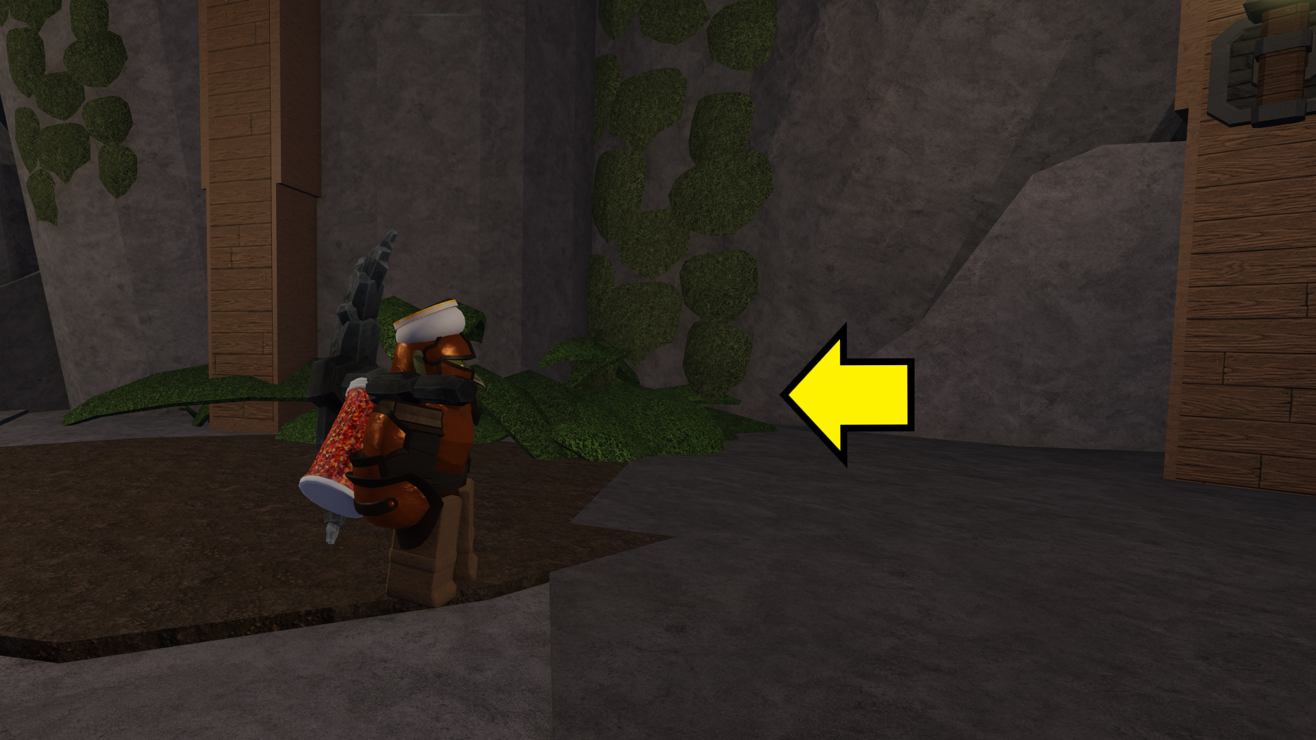 A goblin character standing next to the secret cave where you find the Bard's guitar in The Forge. - 3