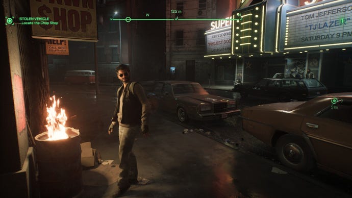 RoboCop looks at a homeless man warming himself by a bin fire in RoboCop: Rogue City.