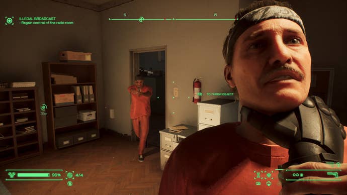 RoboCop grips an enemy by the neck in RoboCop: Rogue City.