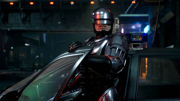 Robocop: Rogue City screenshot showing Robocop coming out of a car, holding the door frame as he stands up