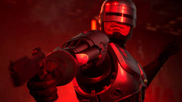 RoboCop: Rogue City - Unfinished Business screenshot showing RoboCop pointing a gun at an unseen target while bathed in blood red light.