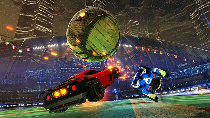 Two players chase the ball in Rocket League - 9