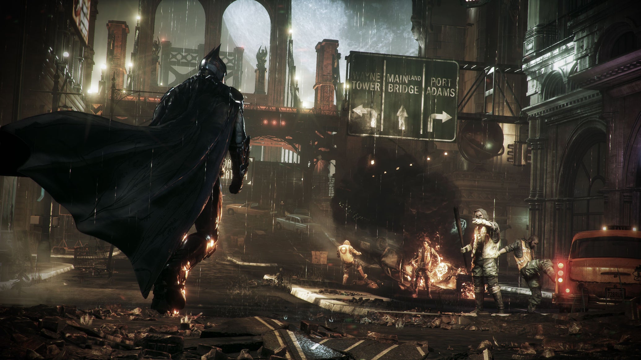 Batman walks in ruined city streets with his cape falpping as looters burn cars in the background. - 1