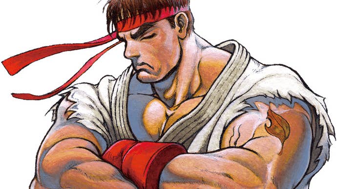 Street Fighter hero Ryu, in illustrated form, arms folded, looking rather unhappy actually. Or as though he’s fallen asleep standing up. Who knows!