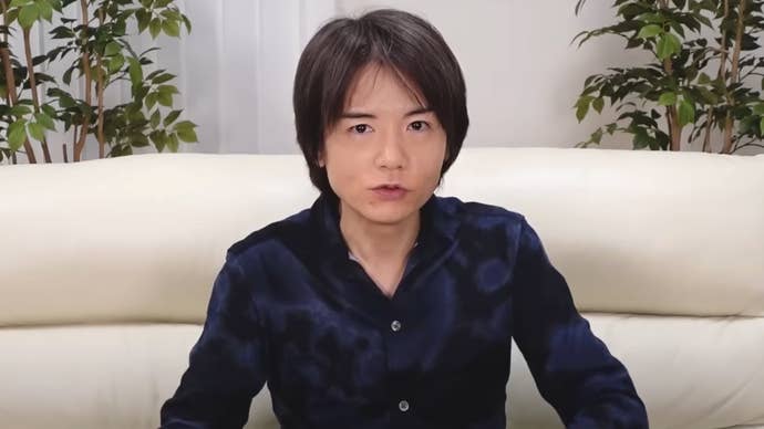 Super Smash Bros. creator Masahiro Sakurai addressing the camera during one of his Creating Games videos.