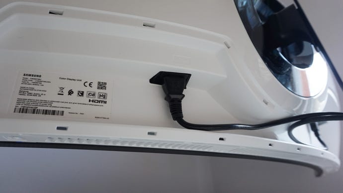 A photo of the Samsung Odyssey G9 gaming monitor’s power port