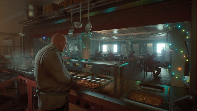 a cook serves food in a packed canteen at christmas in Still Wakes The Deep