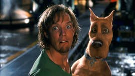 Shaggy n' Scooby up in tha 2002 Scooby-Doo porno lookin scared while stood on a street at night.