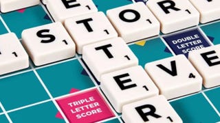 A close-up image of the Scrabble board, showing letter tiles laid out.