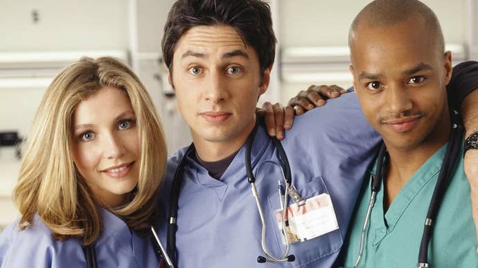 Elliot, JD, and Turk holding each other in Scrubs while looking into the camera.