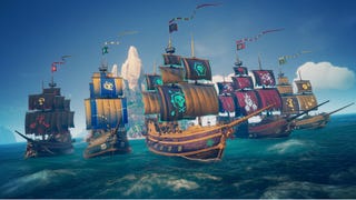 A fleet of ships sail the seas in Sea Of Thieves