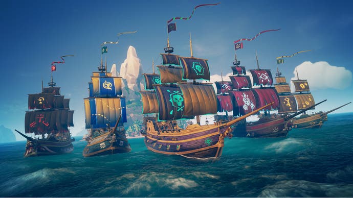 A fleet of ships sail the seas in Sea Of Thieves