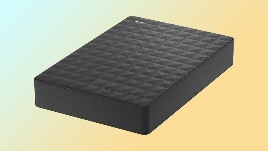a photo with a seagate expansion portable hard drive in front of a coloured background