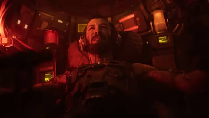 Keanu Reeves is in the cockpit of a mech suit, gritting his teeth in the Armored Core episode of Secret Level.