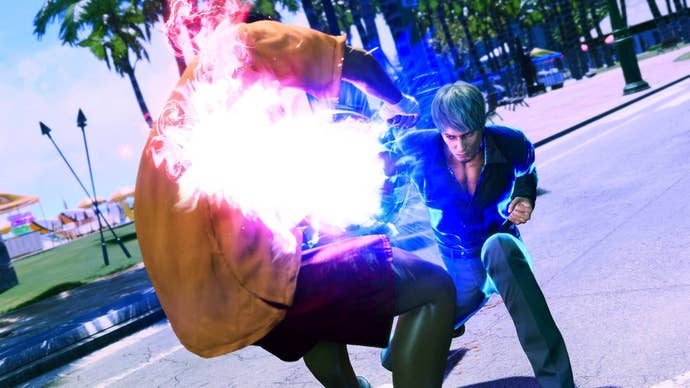 Kazuma Kiryu punching a guy in Like A Dragon: Infinite Wealth.